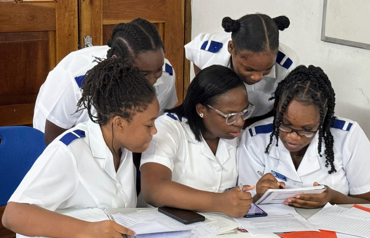 Sigma College students working together